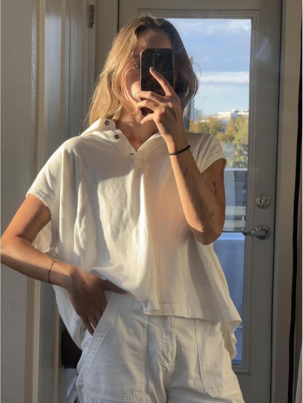 Free People white oversized polo shirt in size M #freepeople #oversized
